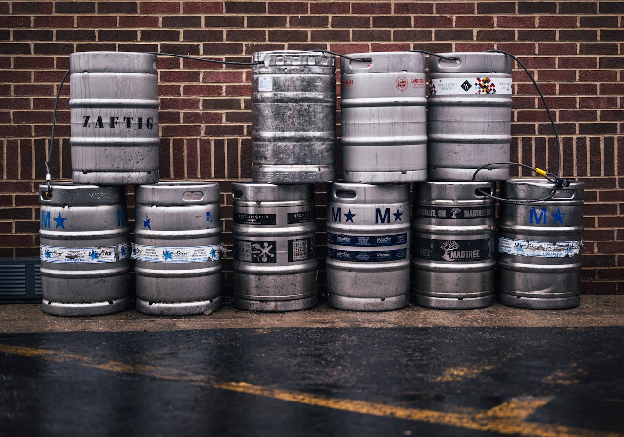 A Stack of Gray Steel Barrels